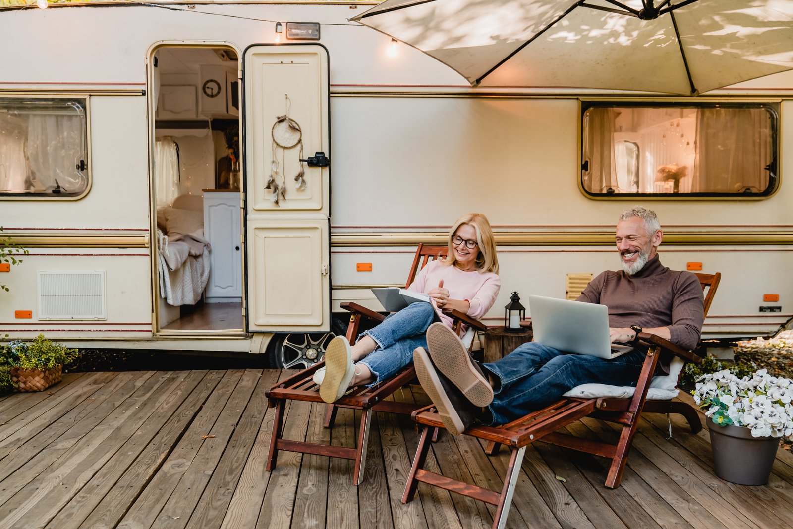 Senior couple relaxing outdoors — enjoying retirement with the freedom a reverse mortgage can provide