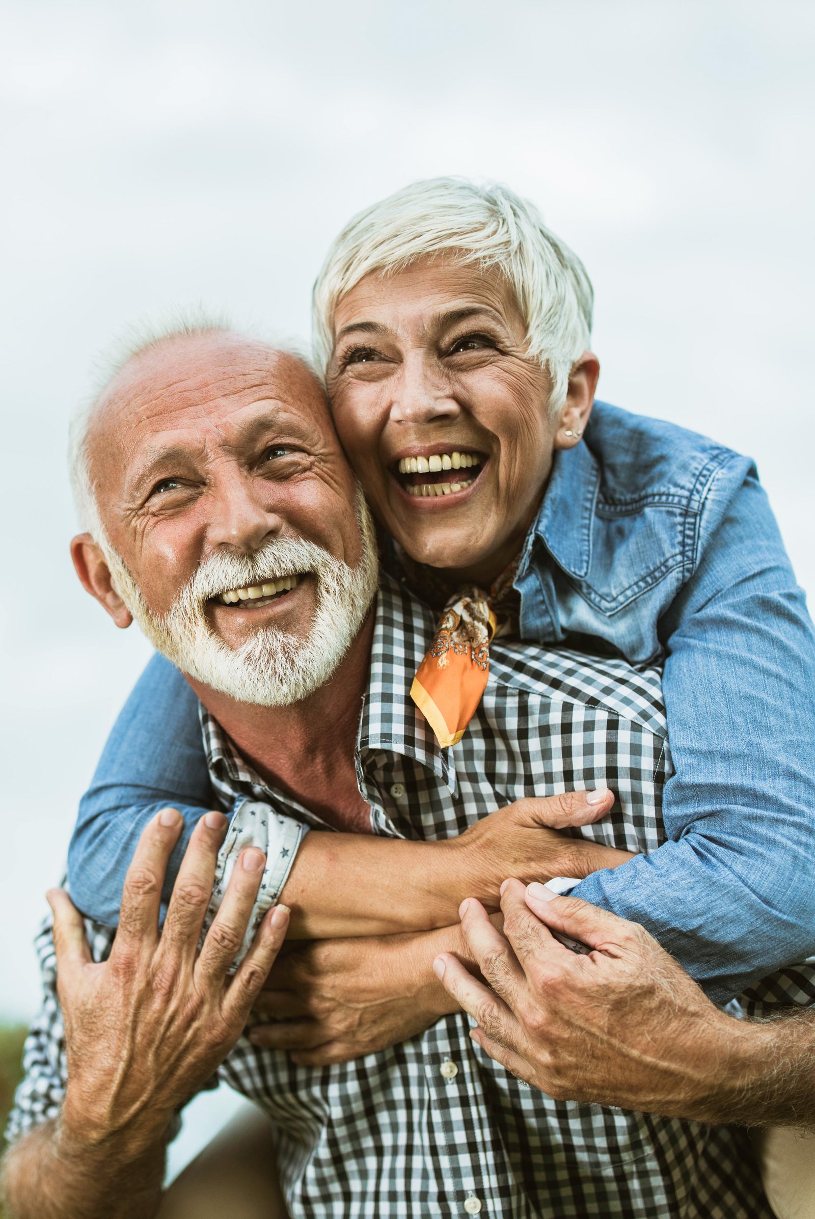 Happy senior couple — confident about their financial future